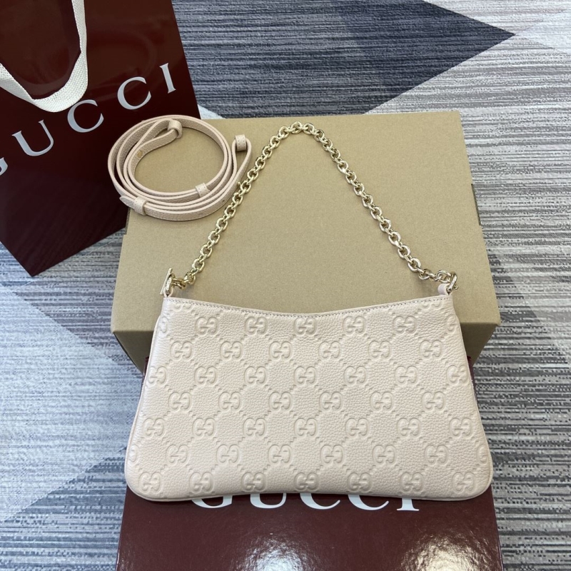G*u*i top handle bags